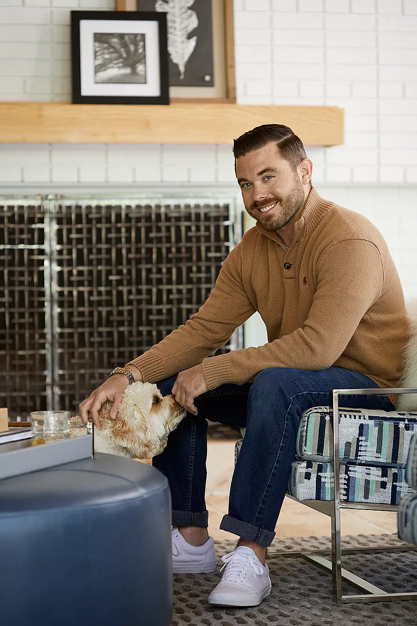 Image of man petting dog 